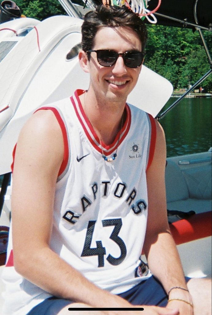 Gavin Hull sitting in a boat
